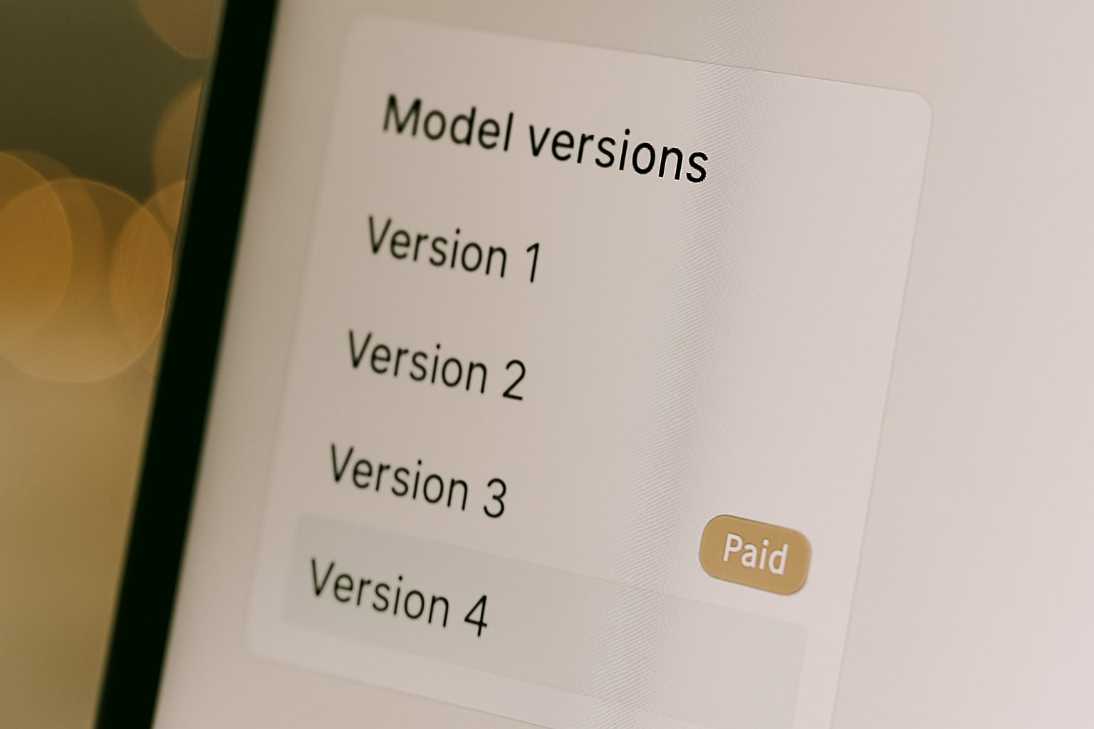 Screen showing model versions with paid access label